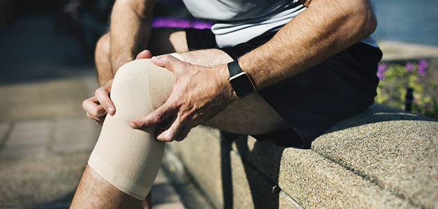 Почему болят колени после бега 
